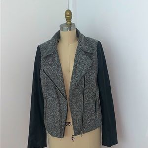 Faux leather jacket with detailed front.